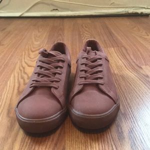 Rust colored tennis shoes